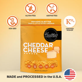 Healthier Comforts cheddar cheese powder being poured ideal for quick cheese sauces