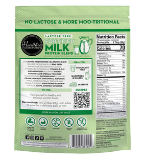 Healthier Comforts milk protein powder on kitchen counter with measuring cup, ideal for protein-boosted recipes.