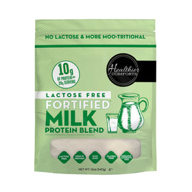 Healthier Comforts lactose-free milk protein powder tub closeup, high-protein dairy alternative.