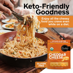 Healthier Comforts Organic Cheddar Cheese Powder on popcorn for savory snack