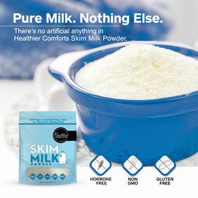 Healthier Comforts skim milk powder being poured into a glass for quick rehydration.