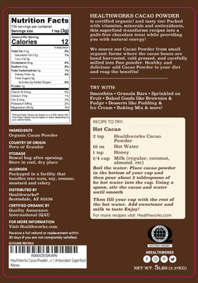 Healthworks cacao powder scoop pouring, convenient for smoothies and shakes.