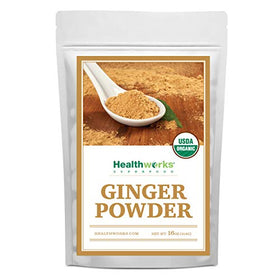 Healthworks Organic Ginger Powder jar on kitchen counter ready for smoothies.