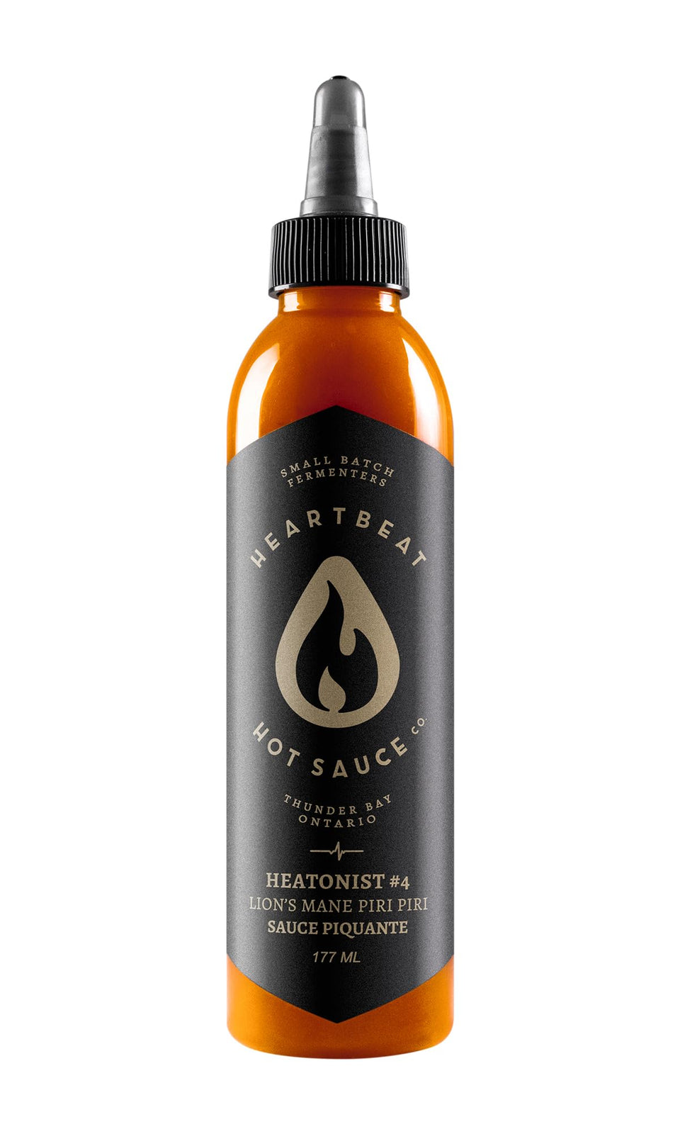 Heartbeat Hot Sauce Co. Lion's Mane Piri Piri bottle pour with balanced heat.