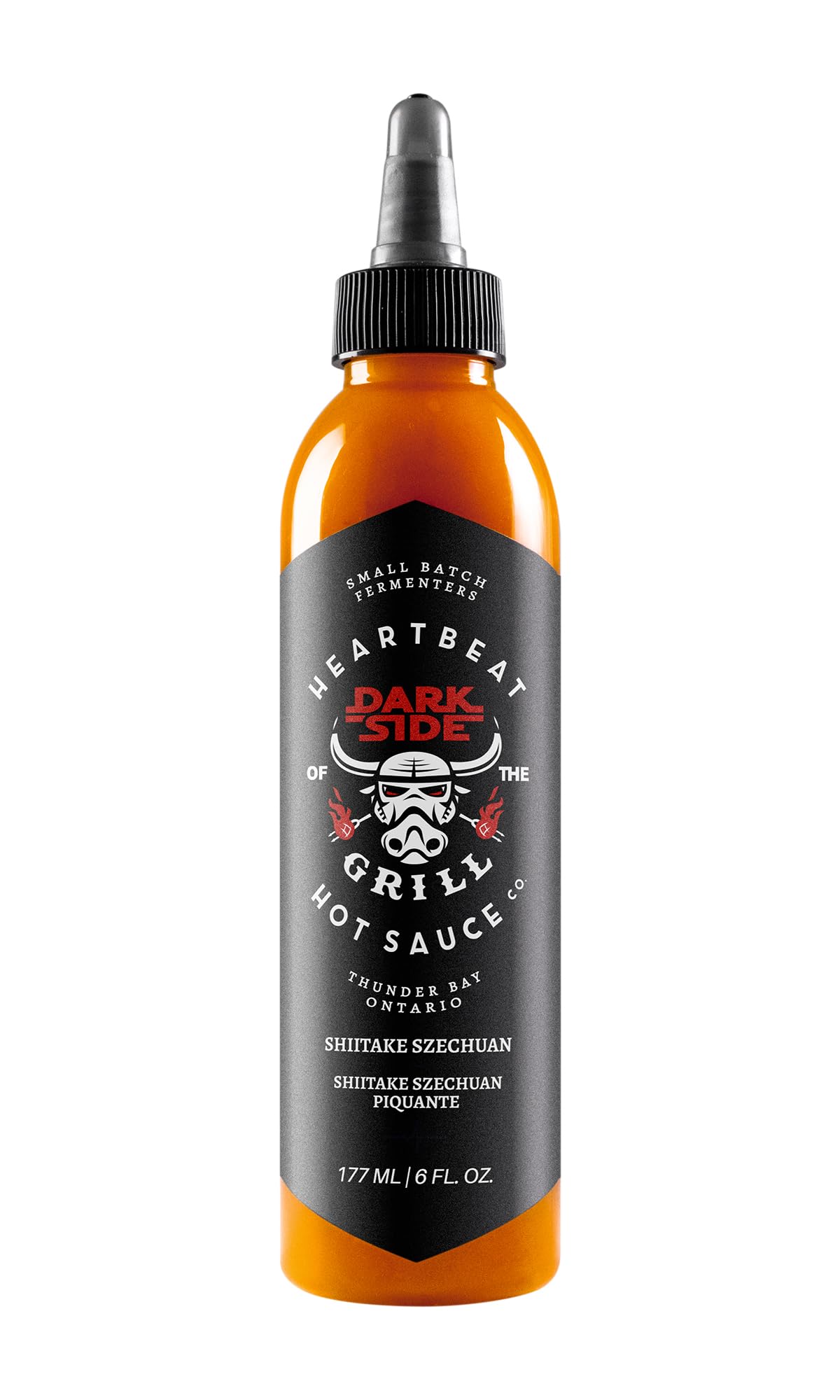 Heartbeat Hot Sauce Co. Shiitake Szechuan bottle pour for wings and ribs.