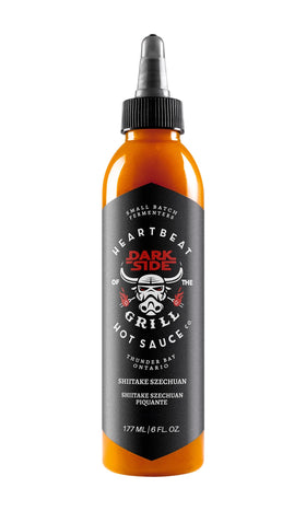 Heartbeat Hot Sauce Co. Shiitake Szechuan bottle pour for wings and ribs.