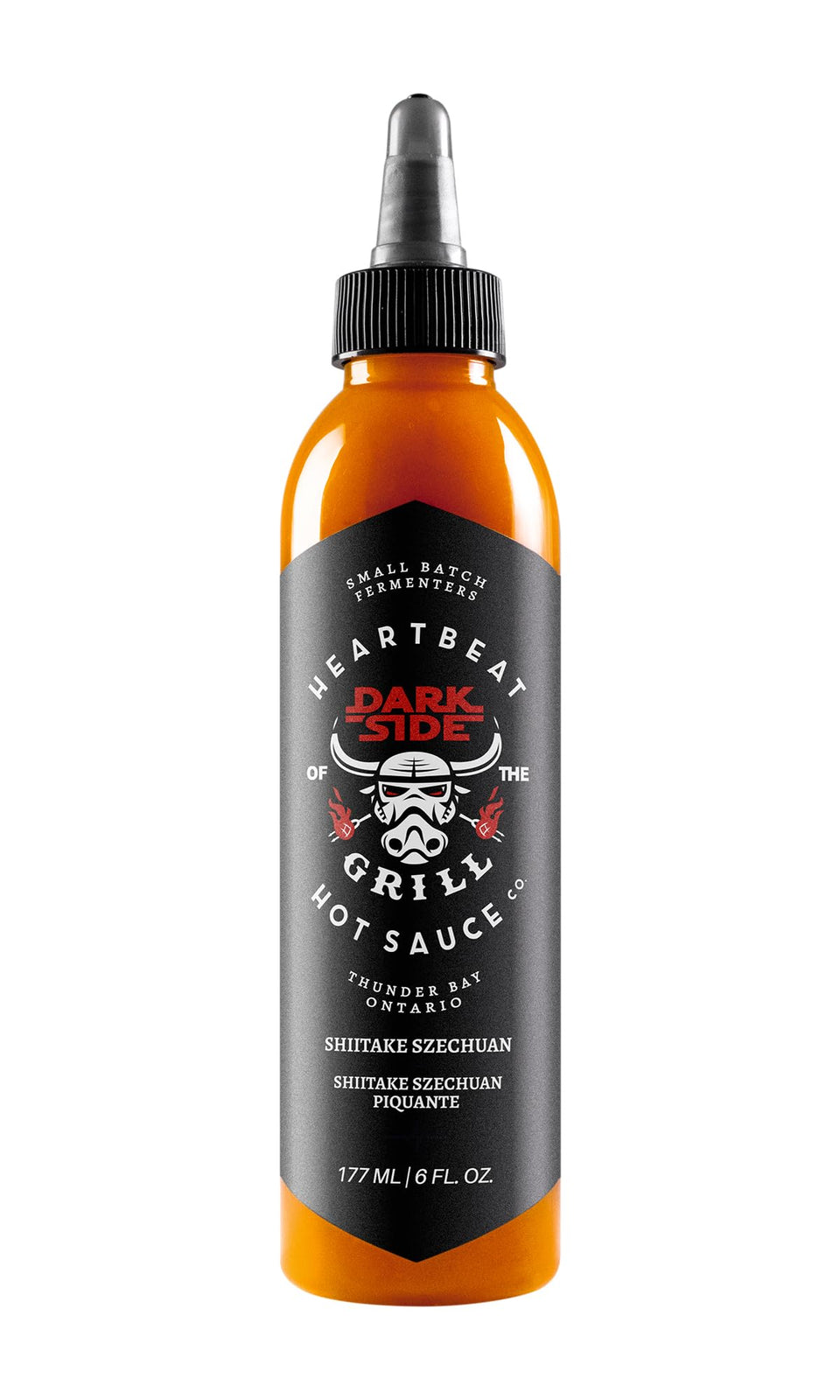 Heartbeat Hot Sauce Co. Shiitake Szechuan bottle pour for wings and ribs.