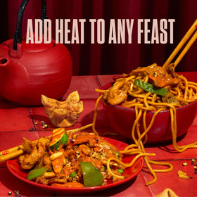Heartbeat Hot Sauce Co. Wings coated with Shiitake Szechuan for dynamic heat.