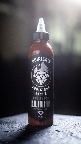 Heartbeat Hot Sauce Co. Poirier's KO Edition label close-up highlights vibrant peppers and authentic styling.