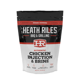 Heath Riles BBQ chicken injector bottle pouring flavorful marinade for juicy chicken.