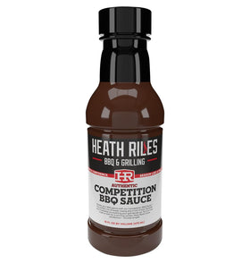 Heath Riles BBQ Competition Sauce bottle pouring over meat for glaze