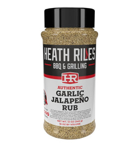 Hea th Riles Garlic Jalapeño BBQ Rub jar close-up boosts savory aroma.