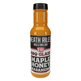 Heathy Riles Maple Honey Habanero glaze bottle pour adds rich maple heat to pork