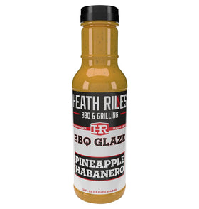 Heath Riles Pineapple Habanero Glaze bottle ready for grilling with bold tropical flavor