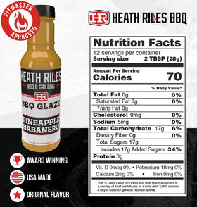 Heath Riles Pineapple Habanero Glaze pouring over ribs for a glossy, spicy finish