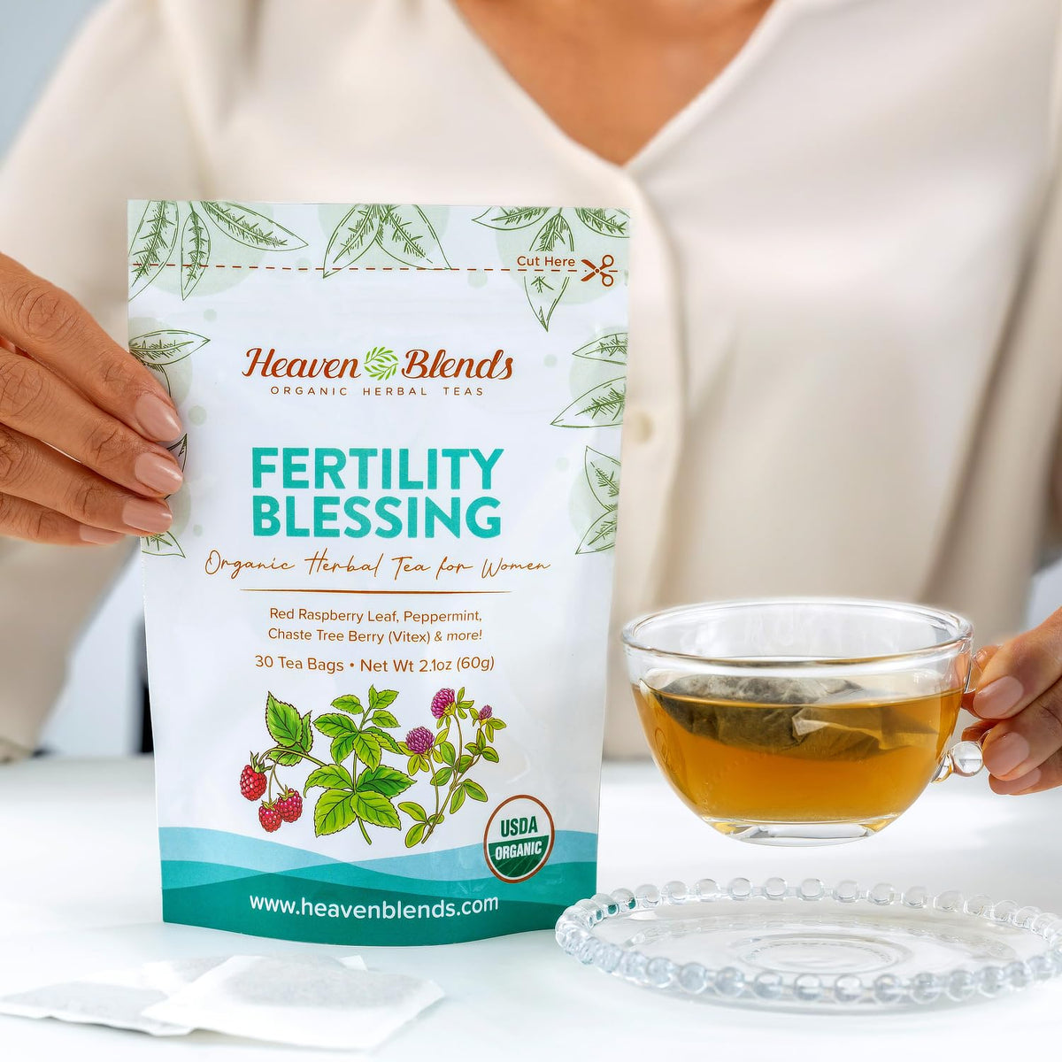 Heaven Blends Fertility Blessing Tea being poured into a cup for a soothing ritual.