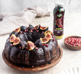 HEAVEN & EARTH Pomegranate Juice no-concentrate badge indicates pure, additive-free juice.
