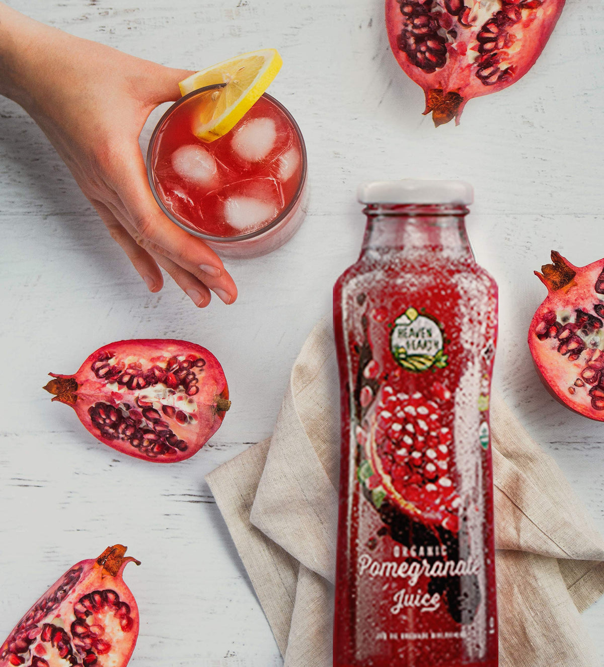HEAVEN & EARTH Pomegranate Juice six-pack display signals value and convenience.