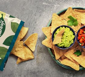 HEAVEN & EARTH Sea Salt chips shown with guacamole for dip-ready snacking.