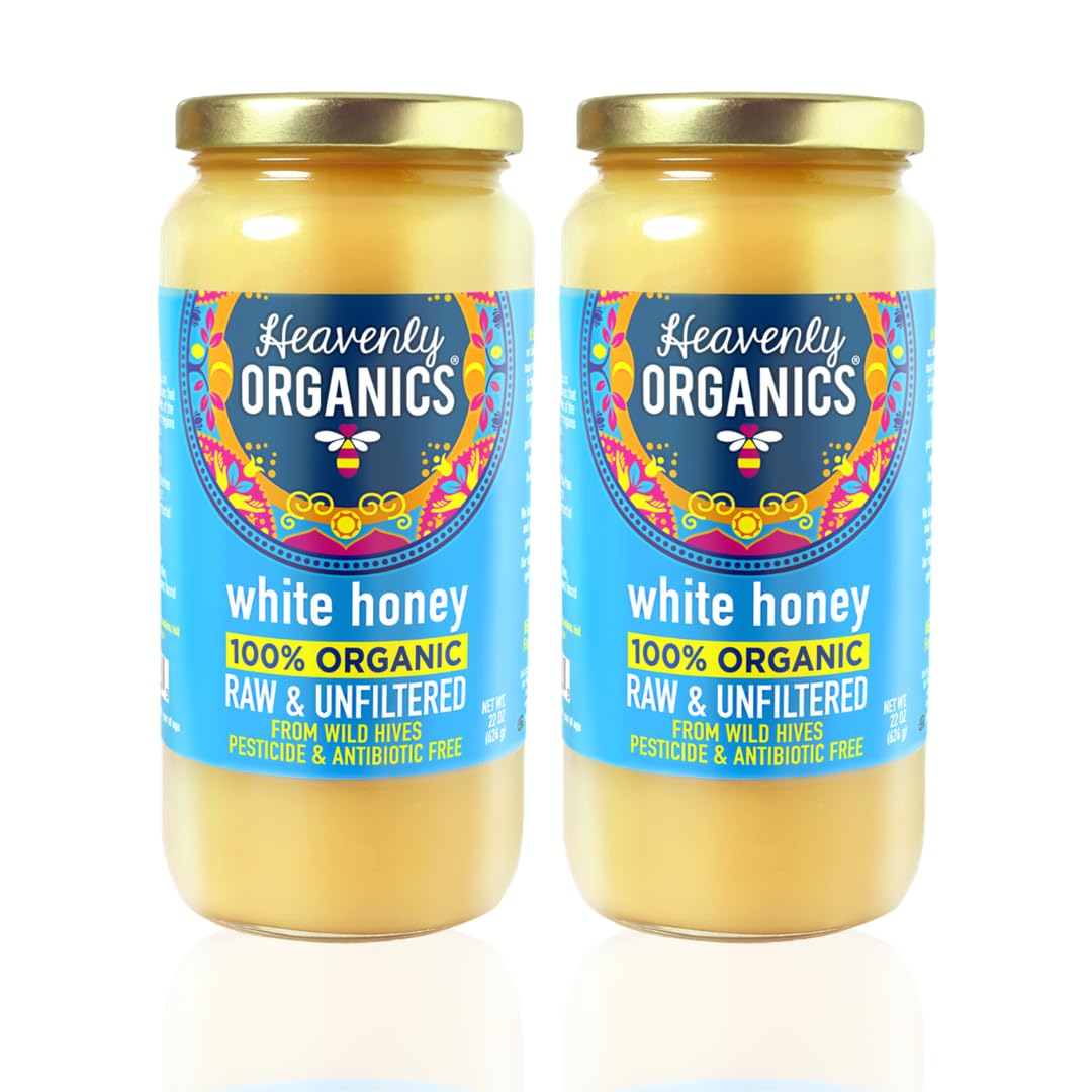 Heavenly Organics raw white honey unheated, showcasing natural enzymes and creamy texture for spreading