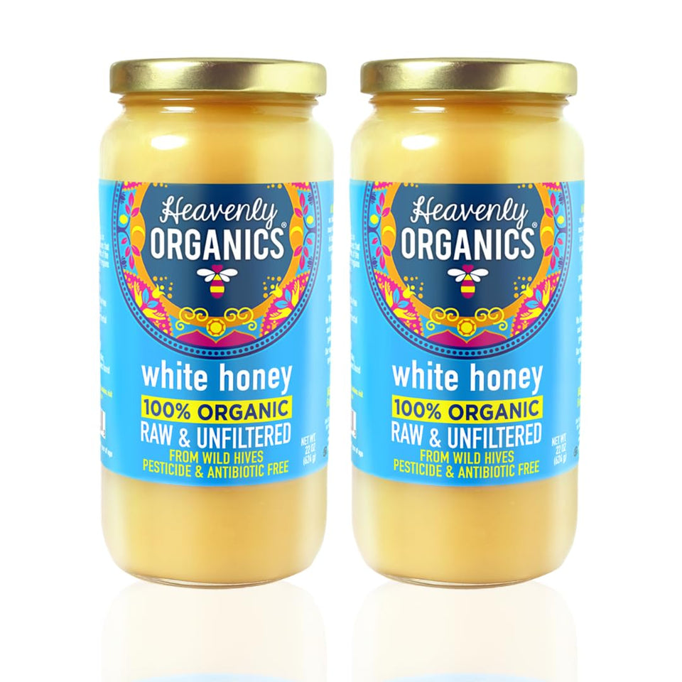 Heavenly Organics raw white honey unheated, showcasing natural enzymes and creamy texture for spreading