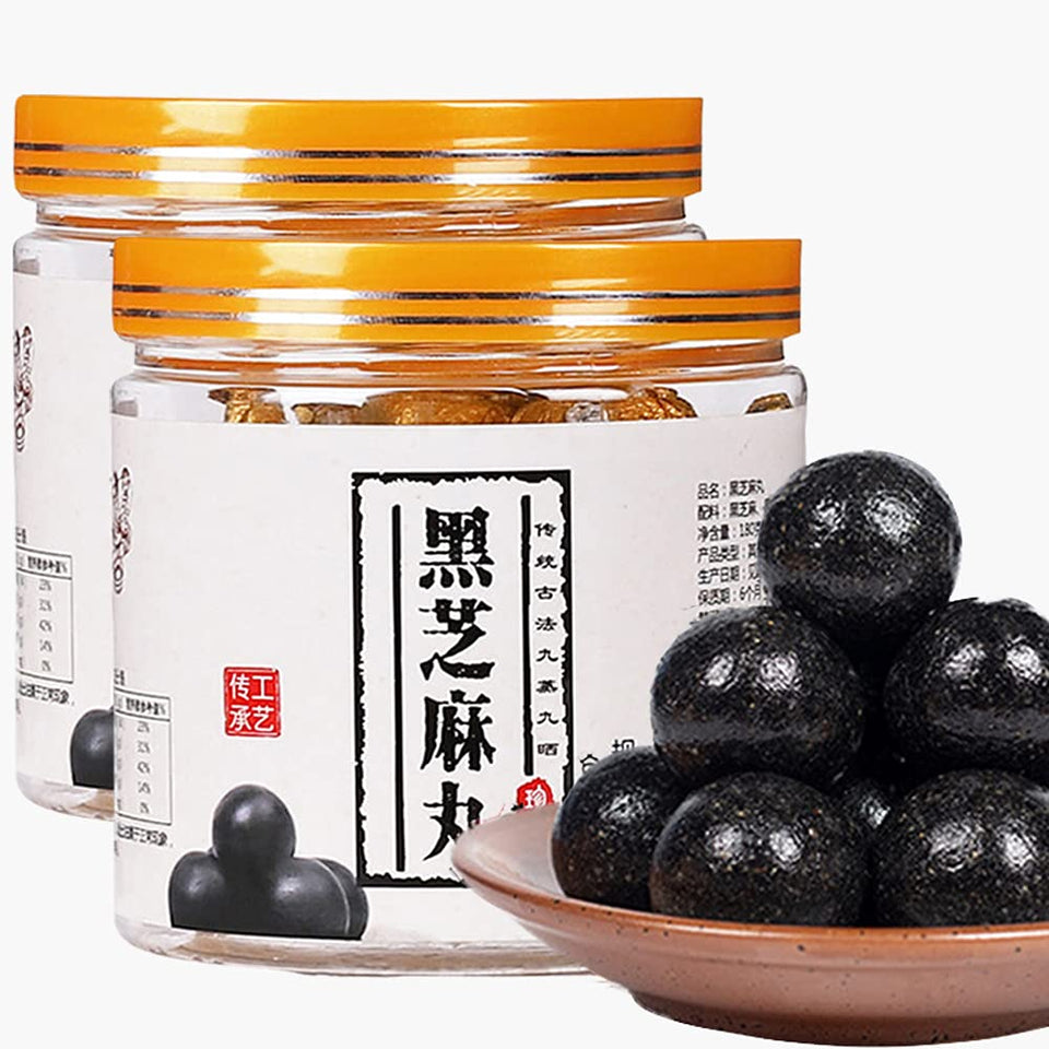 hee creek black sesame balls on plate, glossy texture for a quick nourishing snack