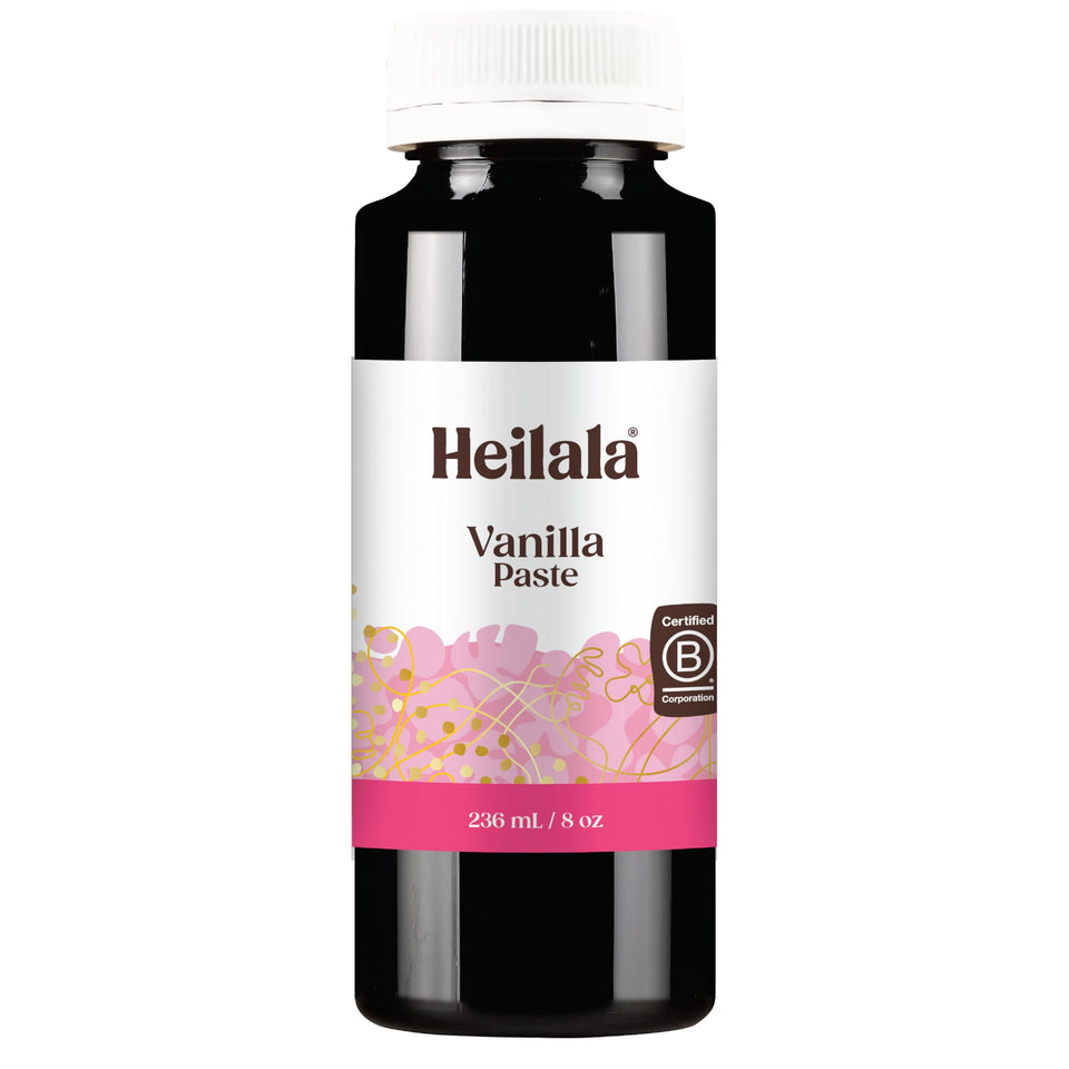 Heilala Vanilla Paste jar with visible speckles for rich flavor in baked goods.