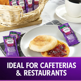 Butter and toast paired with Heinz Grape Jelly for a classic breakfast.