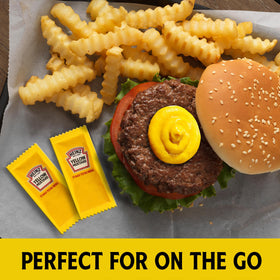 HEINZ single-serve mustard sachet ready for hot dogs and sandwiches.