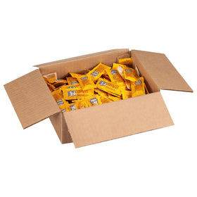 On-the-go condiment: HEINZ mustard packet beside a deli sandwich.