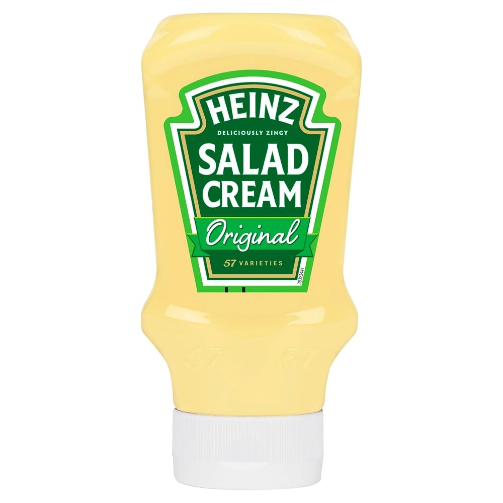 Creamy dressing on salad highlights tangy flavor from HEINZ Salad Cream Original.
