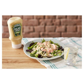 Squeeze-top action bottle for tidy, easy dressing control with HEINZ.