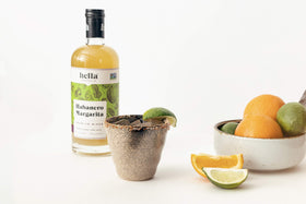 Hella Cocktail Co. Habanero Margarita Mixer glass with lime garnish