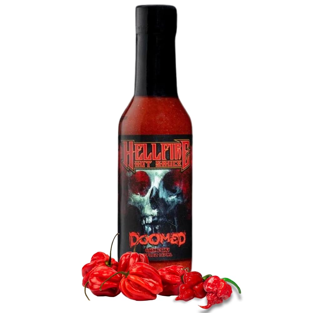Hellfire Doomed Hot Sauce bottle on table delivering bold heat and savory flavor