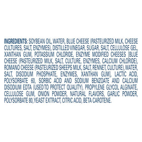 Creamy blue cheese dressing drizzled on a fresh salad, ideal for dipping or topping.