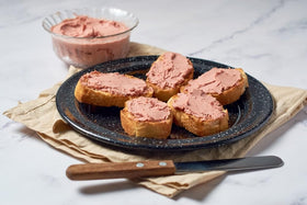 Pate de foie heritage by Henaff on elegant serving setup