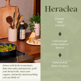 Heraclea Mature Harvest EVOO olive branch close-up, polyphenol-rich oil.