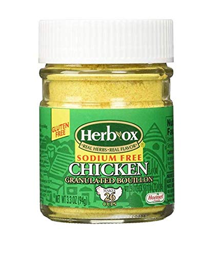 Herb Ox bouillon granules being poured into soup to boost flavor.