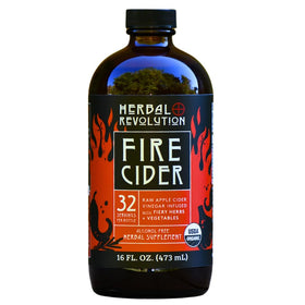 Herbal Revolution Fire Cider bottle being poured for warming flavor.