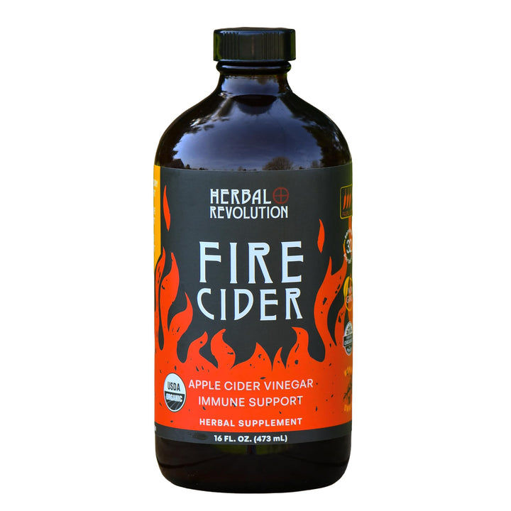 Herbal Revolution Fire Cider bottle being poured for warming flavor.