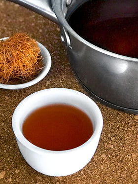 Label on HerbaZest Cat's Claw Tea with gluten-free and vegan badges