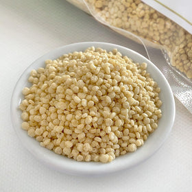 HerbaZest Quinoa Crispies gluten-free badge—confident, clean crunch.