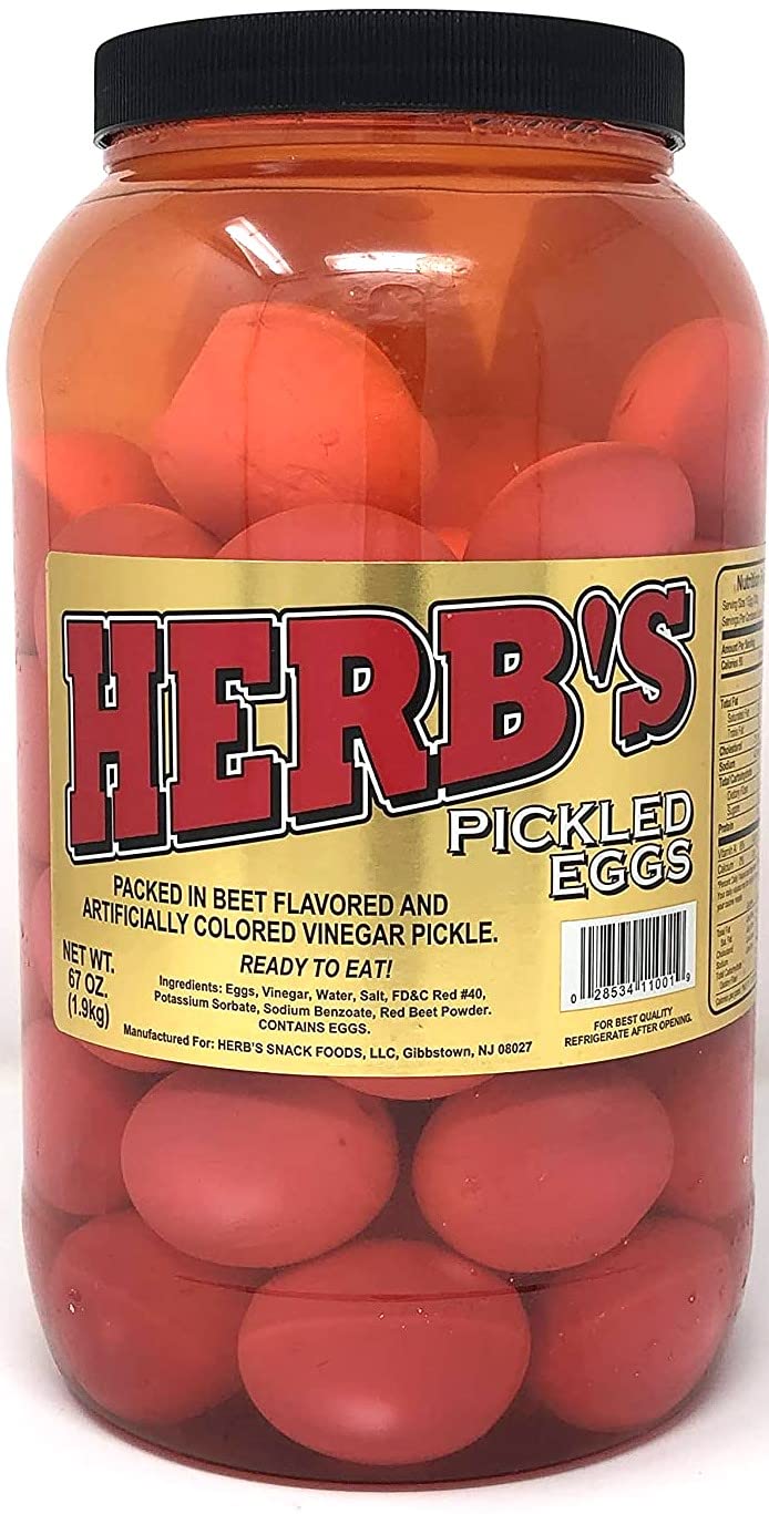 Herb's packed-in-vinegar red pickled eggs in a gallon jar, ideal for bulk entertaining