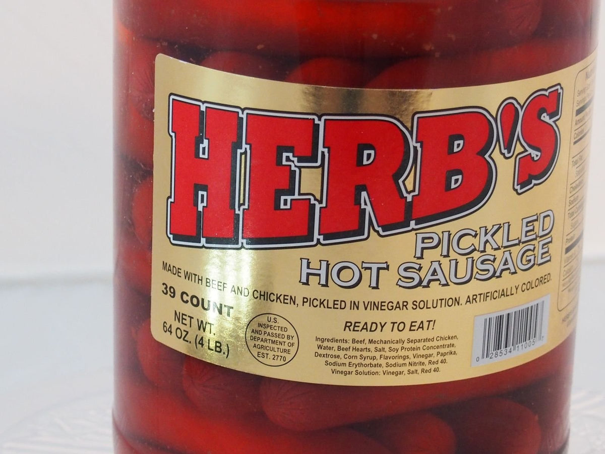 Herbs Red Hot Pickled Sausage close-up highlighting spicy bite