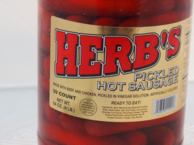 Herbs Red Hot Pickled Sausage label close-up showing bold branding