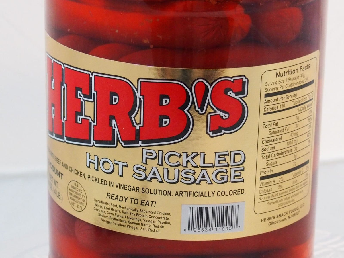 Herbs Red Hot Pickled Sausage plated for serving at a gathering
