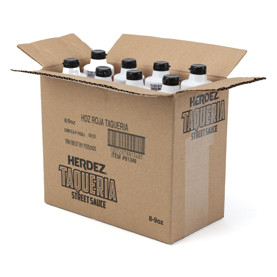 Herdez Taqueria Street Sauce Roja bottle pour showing medium heat for bold, versatile flavor