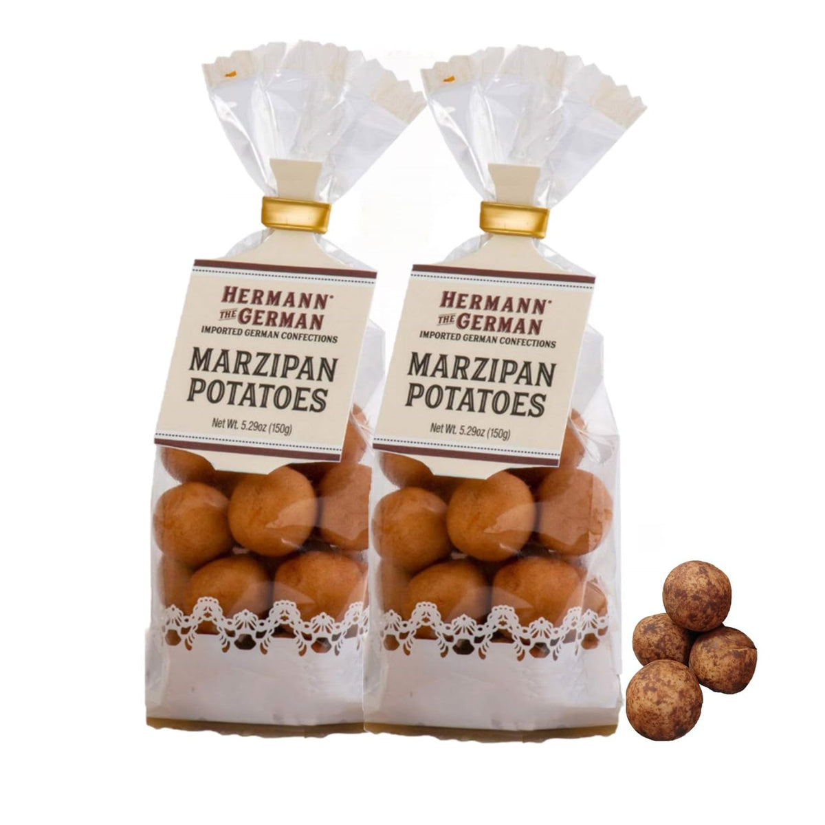 Hermann marzipan potatoes cocoa-sprinkled surface enhances festive presentation.
