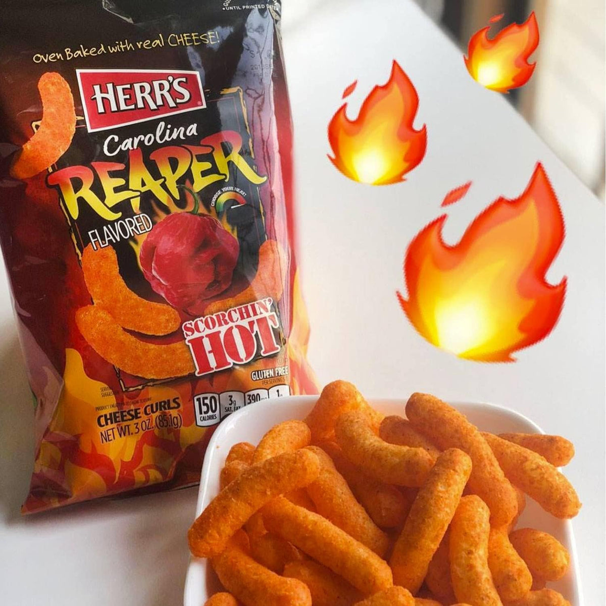 Herr's Carolina Reaper Cheese Curls served on a plate for game night