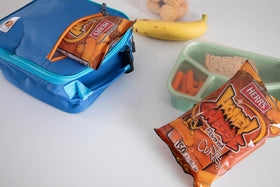 Herr’s Honey Cheese Curls tucked into a lunchbox snack
